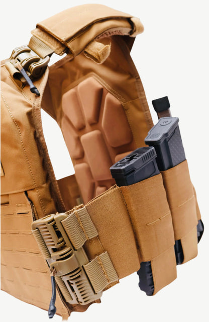 Tan tactical vest with black ammunition pouches on a white background