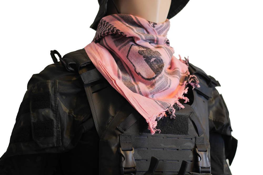 A person wearing a camouflage tactical military scarf in Pink Colour on their head and neck.