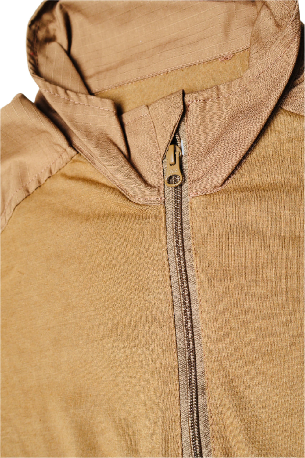 Close-up of a brown hooded jacket with a zipper