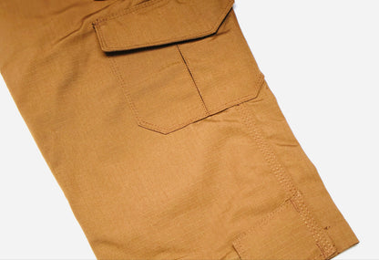 Close-up of brown pants with a pocket on a white background