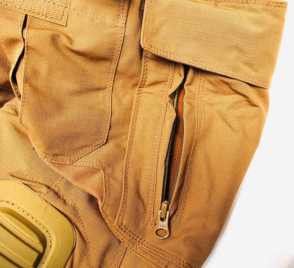 Close-up of brown tactical pants with a zipper on a white background